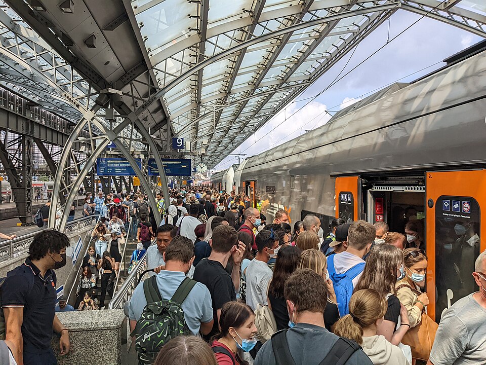 Crowded train platform showing busy public transport travel