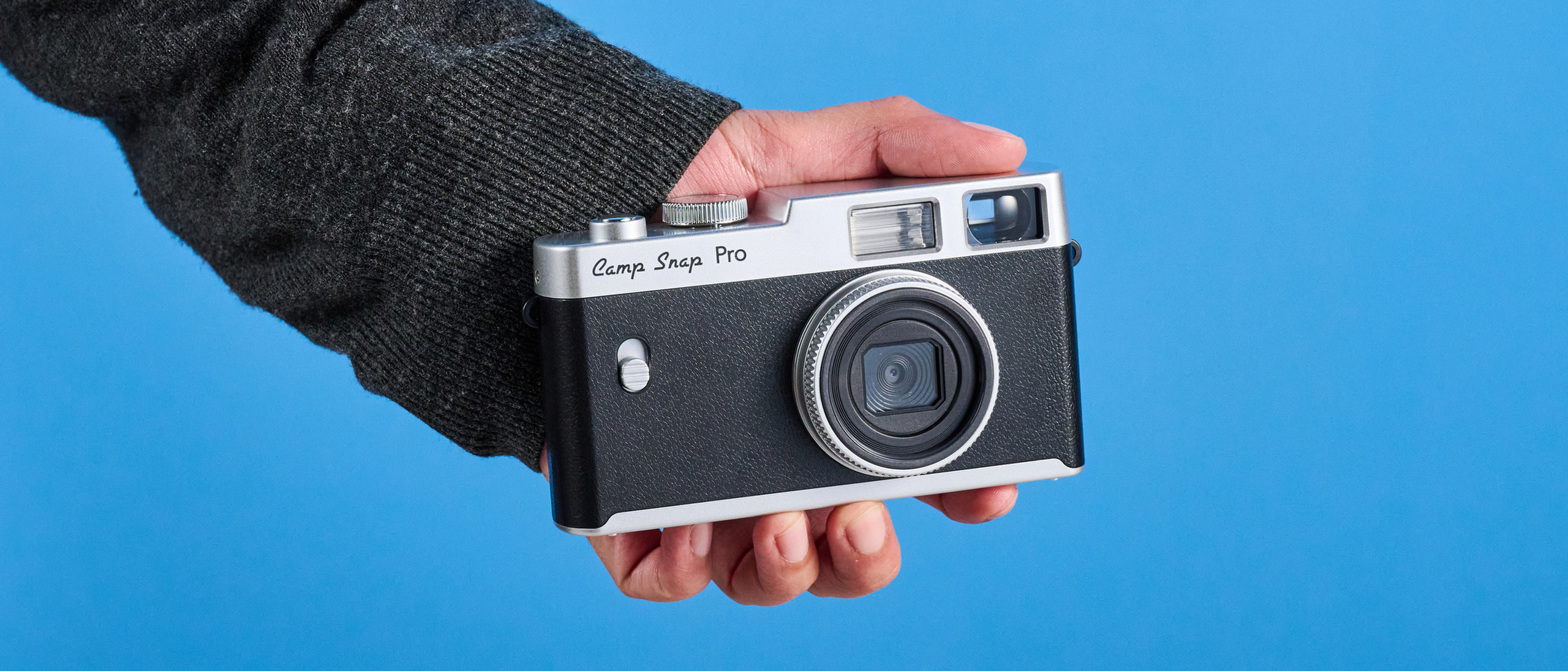 Camp Snap CS-Pro held in hand showing its compact screen-free design